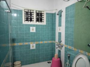 Koupelna v ubytování Prashanth Family Homestay
