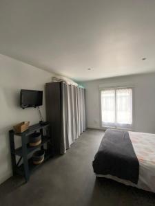 Μια τηλεόραση ή/και κέντρο ψυχαγωγίας στο Logement spacieux 70m2