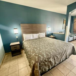 Postel nebo postele na pokoji v ubytování Weslaco Inn - Weslaco/Mercedes