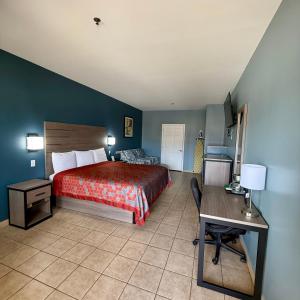 Postel nebo postele na pokoji v ubytování Weslaco Inn - Weslaco/Mercedes