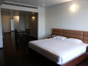 Malabar Residency客房内的一张或多张床位
