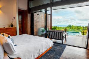 Postel nebo postele na pokoji v ubytování Ecolirios Boutique Hotel & Villas