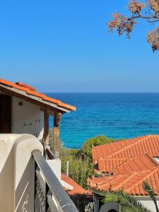 a view of the ocean from a house at Marinos Studios and Apartments in Gialiskari
