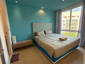 Atlantis Condo Resort 객실 침대