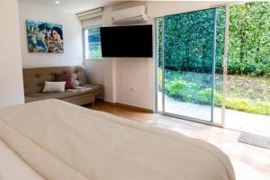 Postel nebo postele na pokoji v ubytování Libertg Hotels Spa Medellin
