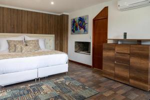 Postel nebo postele na pokoji v ubytování Libertg Hotels Spa Medellin