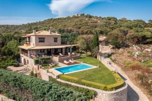 an aerial view of a villa with a swimming pool at Villa Vicanti in Pylos