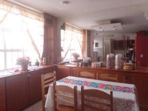 Kuchyň nebo kuchyňský kout v ubytování Killitas home&apart