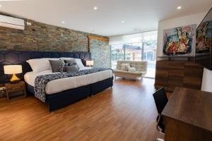 Postel nebo postele na pokoji v ubytování Libertg Hotels Spa Medellin