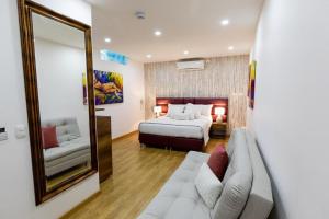 Postel nebo postele na pokoji v ubytování Libertg Hotels Spa Medellin
