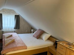 Postel nebo postele na pokoji v ubytování Relax Apartman