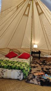 Postel nebo postele na pokoji v ubytování Glamping Xicotepec