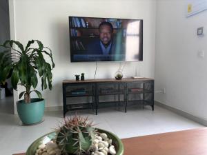Televízia a/alebo spoločenská miestnosť v ubytovaní Corralejo Suite Pool & Gardens - Alisios Playa