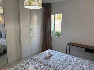 Posteľ alebo postele v izbe v ubytovaní Corralejo Suite Pool & Gardens - Alisios Playa