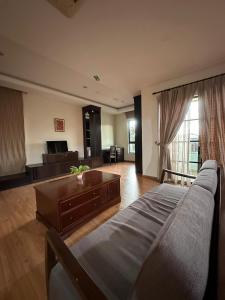 Posezení v ubytování Maxwell Inn Luxury Hotel