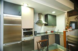 Una cocina o zona de cocina en El Rincón del Tarabilla