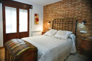 Cama o camas de una habitación en El Rincón del Tarabilla