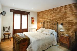 Cama o camas de una habitación en El Rincón del Tarabilla