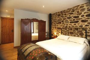 Cama o camas de una habitación en El Rincón del Tarabilla