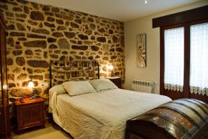 Cama o camas de una habitación en El Rincón del Tarabilla
