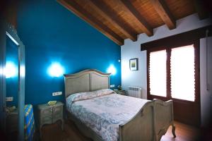 Cama o camas de una habitación en El Rincón del Tarabilla