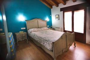 Cama o camas de una habitación en El Rincón del Tarabilla