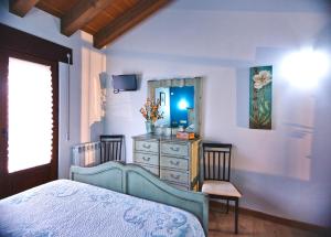 Cama o camas de una habitación en El Rincón del Tarabilla