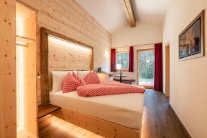 Postel nebo postele na pokoji v ubytování Hotel Appartement Haus Gitschberg