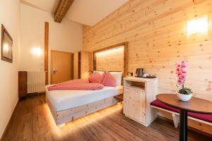 Postel nebo postele na pokoji v ubytování Hotel Appartement Haus Gitschberg