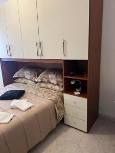 Postel nebo postele na pokoji v ubytování Alloggio turistico FRANCY HOME