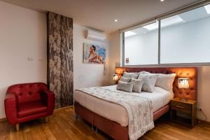 Postel nebo postele na pokoji v ubytování Libertg Hotels Spa Medellin