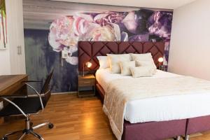 Postel nebo postele na pokoji v ubytování Libertg Hotels Spa Medellin
