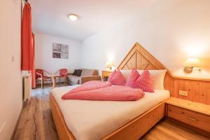 Postel nebo postele na pokoji v ubytování Hotel Appartement Haus Gitschberg