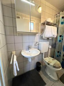 Ванная комната в Hiška 231 - Kamp Terme 3000 - Brezplačne karte za kopališče!