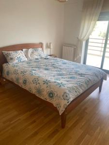 Ένα ή περισσότερα κρεβάτια σε δωμάτιο στο Sesimbra Seaside Apartment, Pool, Garage