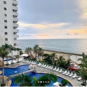 Swimmingpoolen hos eller tæt på Lodging Apartamento 31 Frente a la Playa