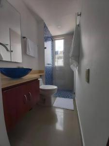 Et badeværelse på Lodging Apartamento 31 Frente a la Playa