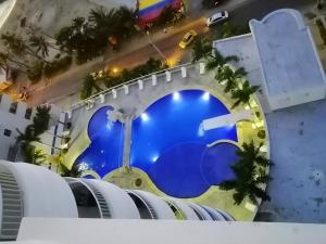 Swimmingpoolen hos eller tæt på Lodging Apartamento 31 Frente a la Playa + 7 billeder