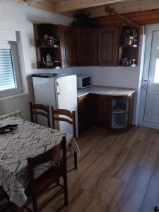 Kuchyň nebo kuchyňský kout v ubytování Rent a rooms - "Laki"