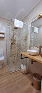 a bathroom with a shower and a sink at Xanela Xures in Muiños +52 photos