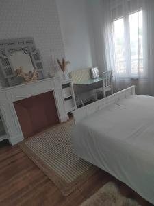 Postel nebo postele na pokoji v ubytování Maison Charmante