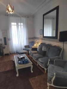 Posezení v ubytování Maison Charmante