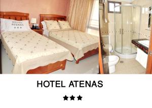 Baðherbergi á Hôtel Atenas