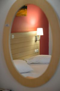 Posteľ alebo postele v izbe v ubytovaní Rouda Bay Beach Hotel