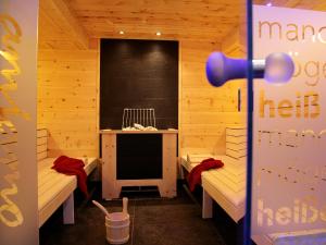 Postel nebo postele na pokoji v ubytování Familotel Amiamo
