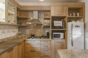 Dapur atau dapur kecil di Casa Eva, rústica y cálida familiar
