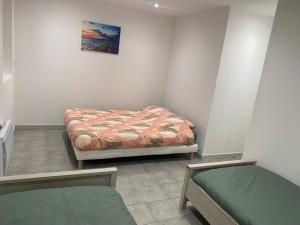 Postel nebo postele na pokoji v ubytování Appartement 1 - Hyper centre - 1 à 8 personnes