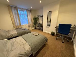 Ένα ή περισσότερα κρεβάτια σε δωμάτιο στο Lodge Causeway 4 bedroom house