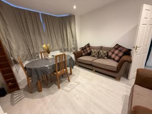 Χώρος καθιστικού στο Lodge Causeway 4 bedroom house