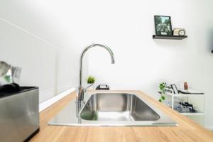 Kuchyň nebo kuchyňský kout v ubytování Valguarnera Studio Apartments